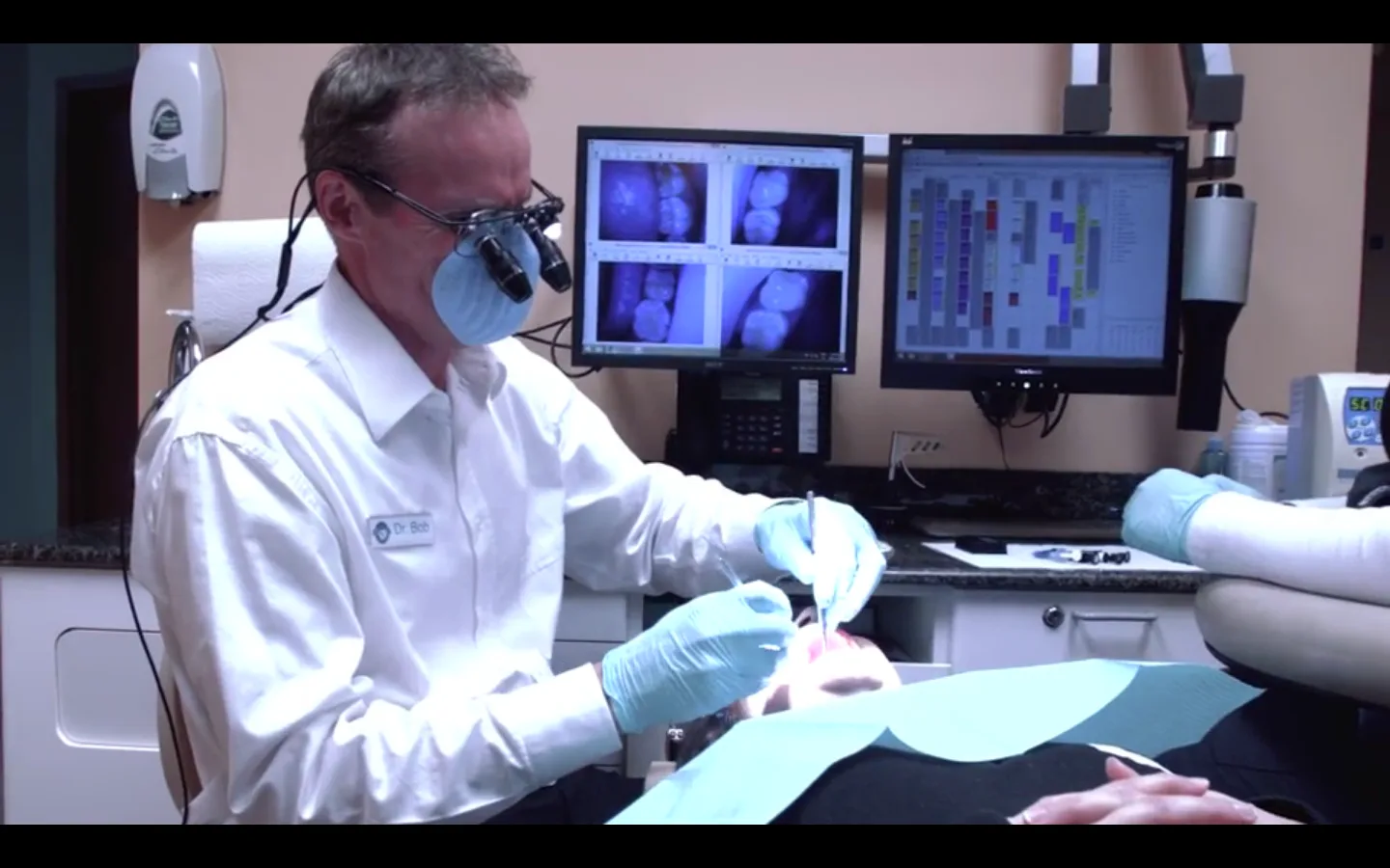 Dr. Bob MacInnis providing same-day emergency dental care to a patient in Orillia